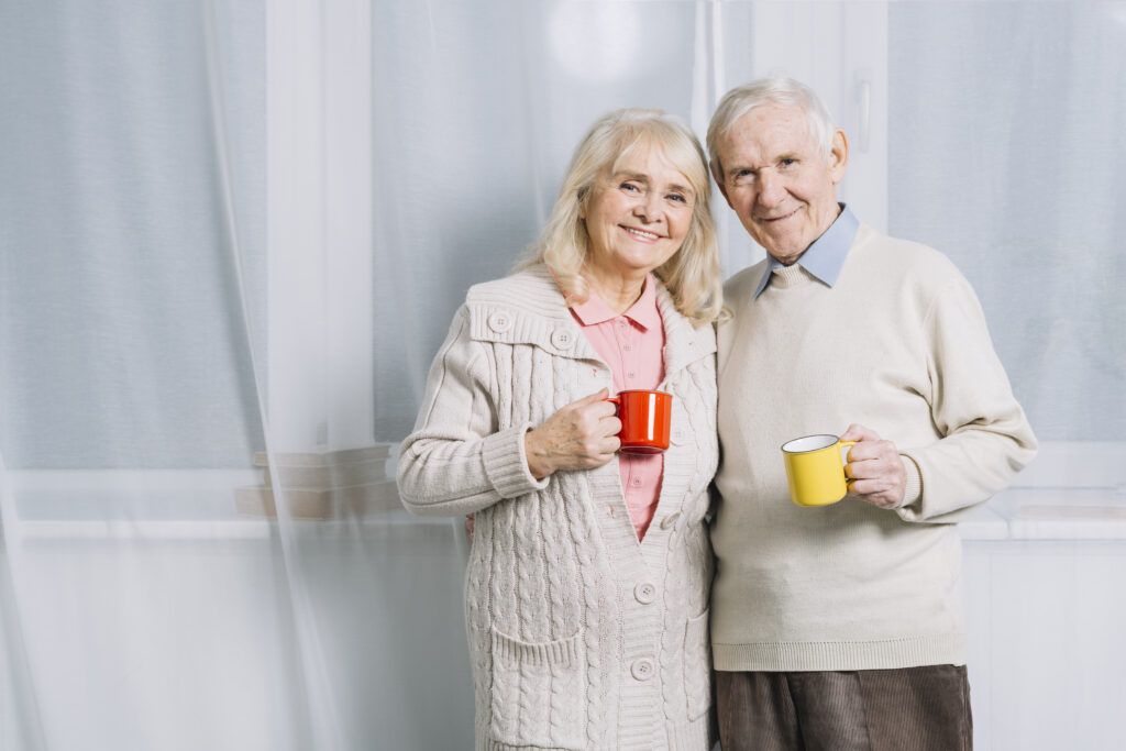 senior couple with mugs coffee 1024x683 1